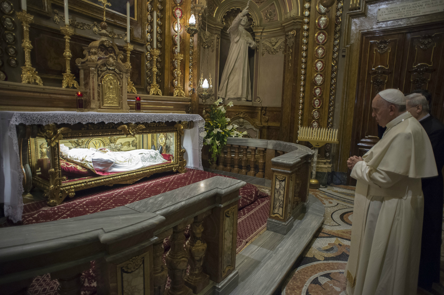 Pope Francis at the tomb of Saint Don Bosco