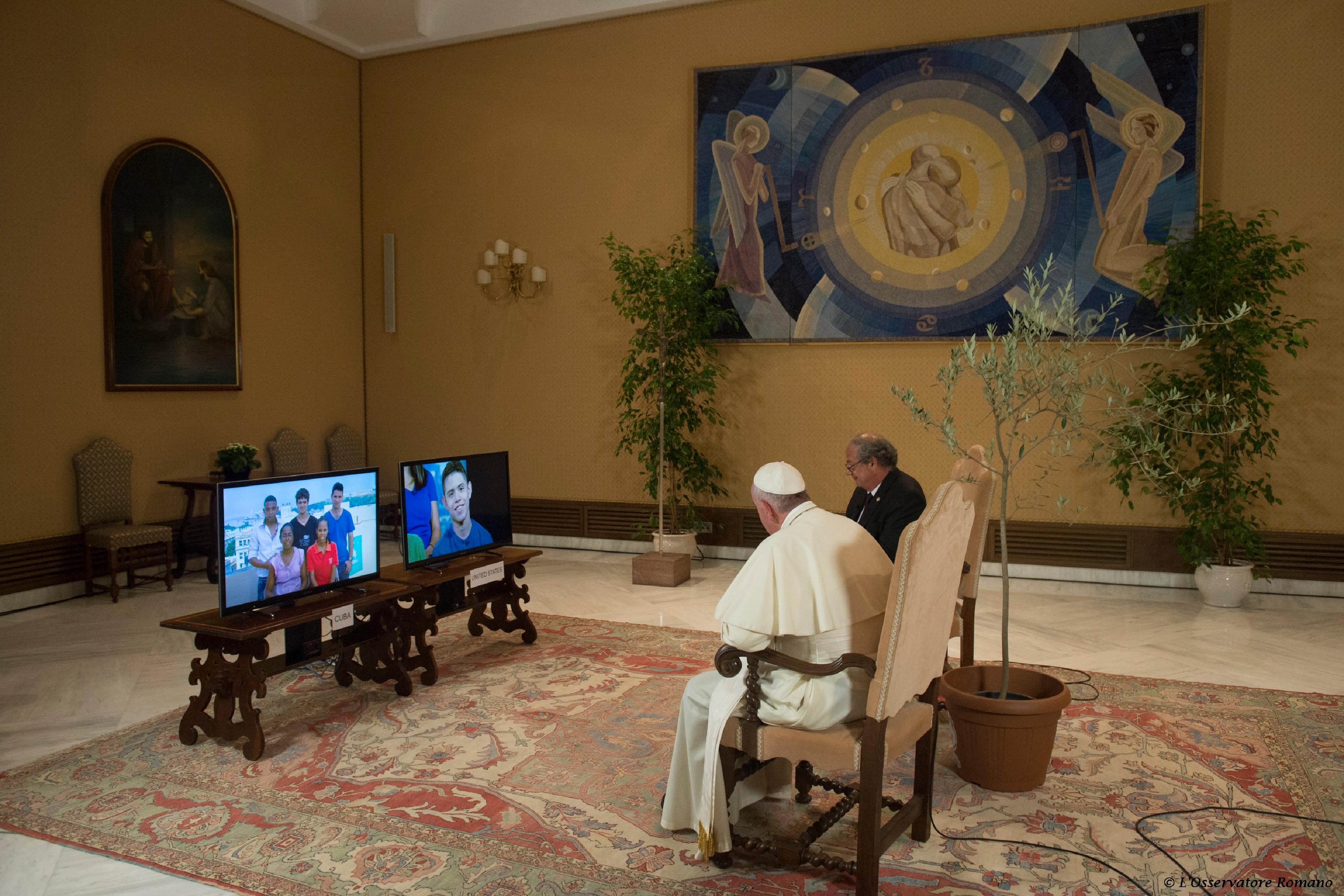Pope Francis responds from the Vatican to questions from students in Cuba and USA during a CNN teleconference