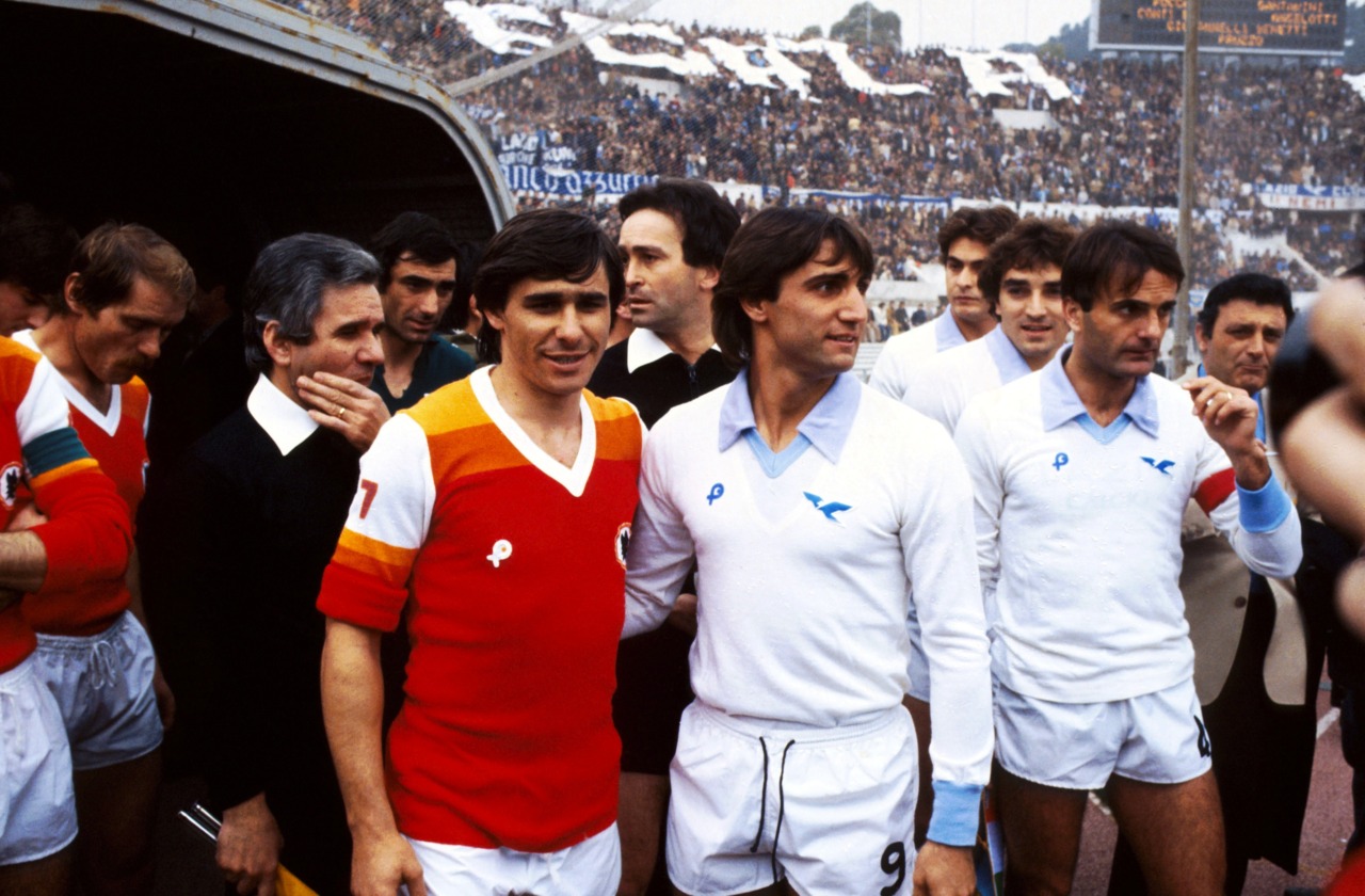 Captains of SS Lazio (R) and AS Roma (L) shake hands before the derby of the season 1979-1980