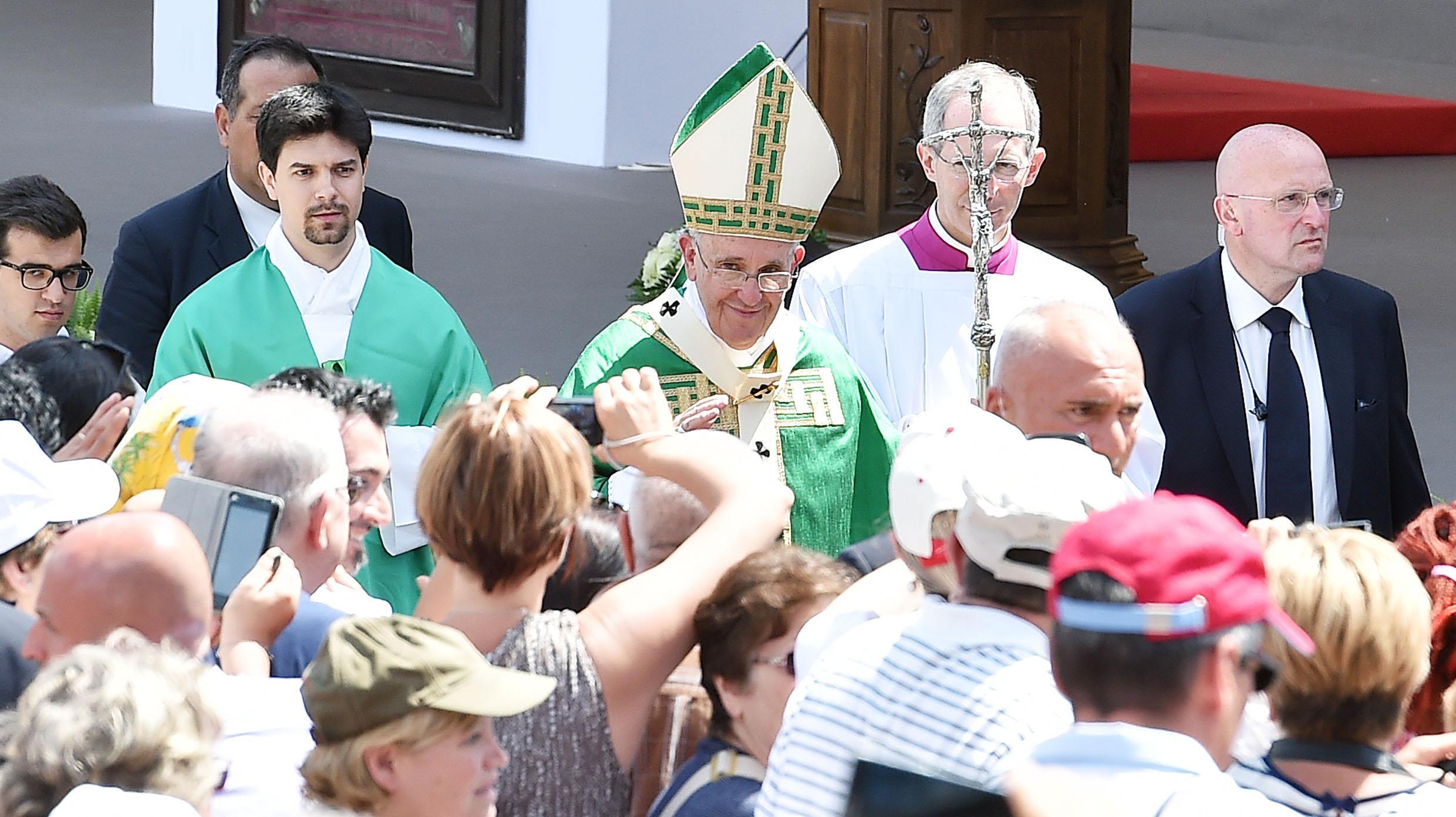 Pope Francis greets faithful as he leaves Piazza Vittorio in Turin after the celebration of Holy Mass on Sunday