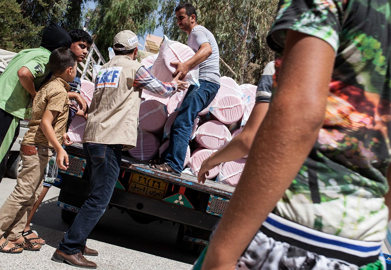 Action Against Hunger team deliver hygiene kits to Iraqi refugees