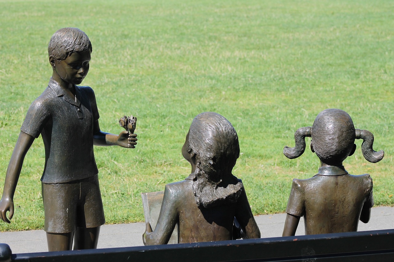 Statue in a park representing kids